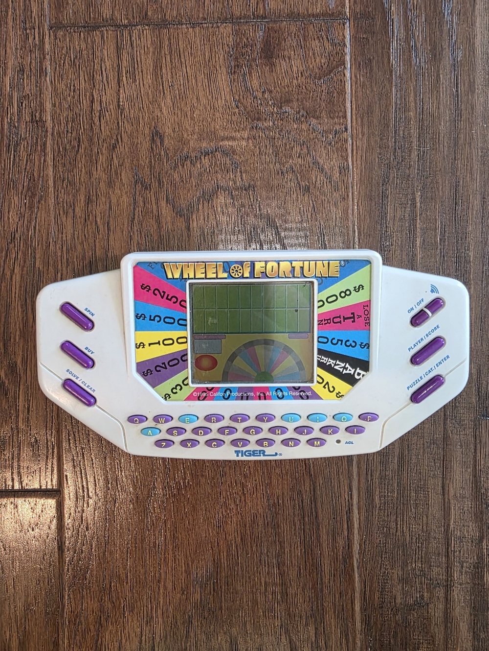Vintage 1995 Tiger Electronics Wheel of Fortune Handheld Game with Cartridge 7 - Picture 6 of 7